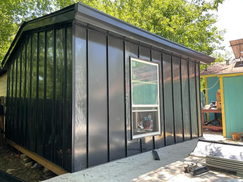 Black standing seam metal wall panels for Roof Inspection in Lawton